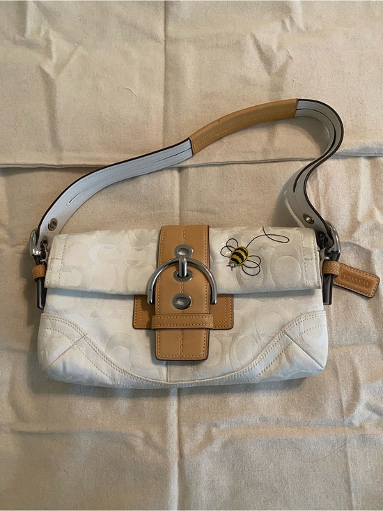 Coach Handbags - Coach White Signature Canvas Shoulder Bag with Tan Leather Trim and Bee Accent